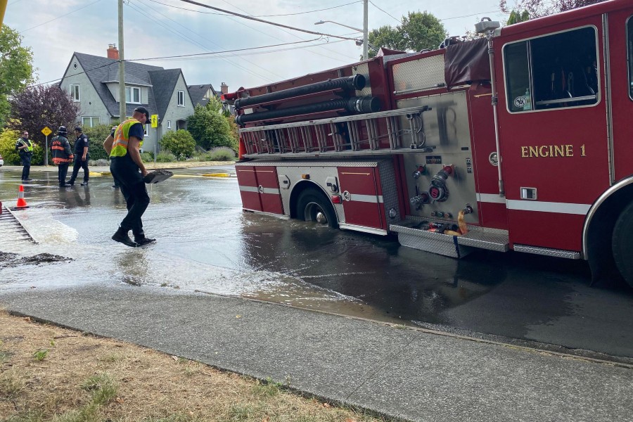 Oak Bay fire truck gets stuck in sink hole after water main break